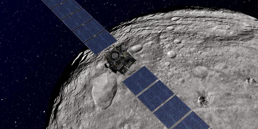Artistieke impressie van de Dawn ruimtesonde in een baan om Vesta