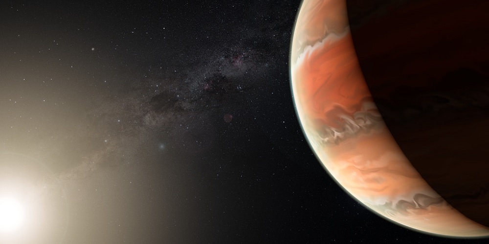 Deze artist’s impression toont de exoplaneet WASP-19b. In de atmosfeer van deze hete, Jupiterachtige planeet hebben astronomen voor het eerst titaniumoxide gedetecteerd. 